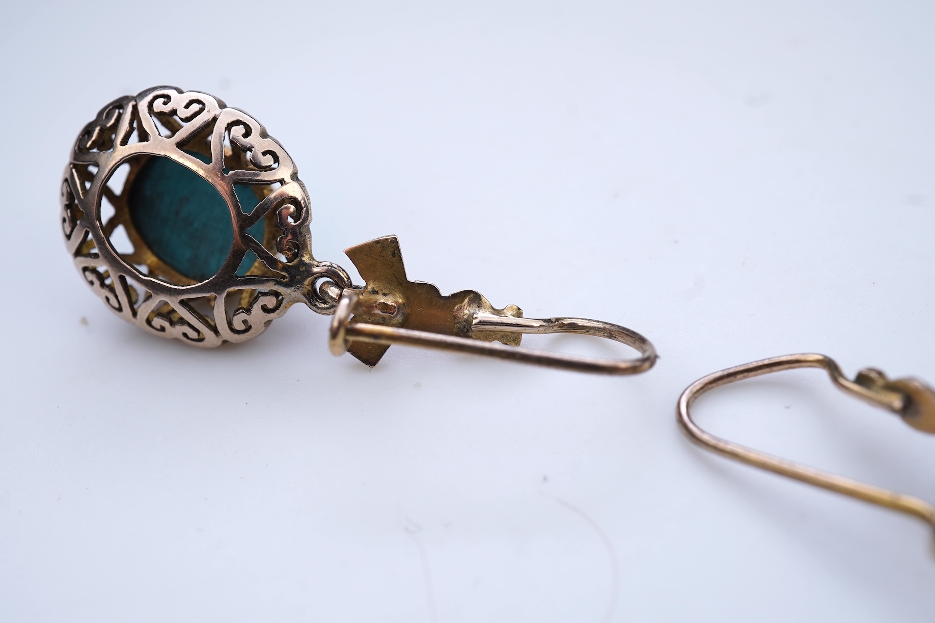 A pair of simulated turquoise earrings